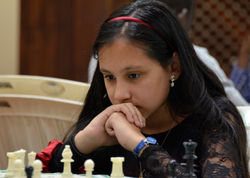 12 year-old Ashwina Haria-Skuse of England in action. She ended up with a respectable 4.5 points out of 6 games. Photo credit Kim Bhari.